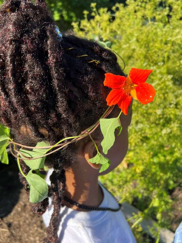 Girl with Garland in School Garden