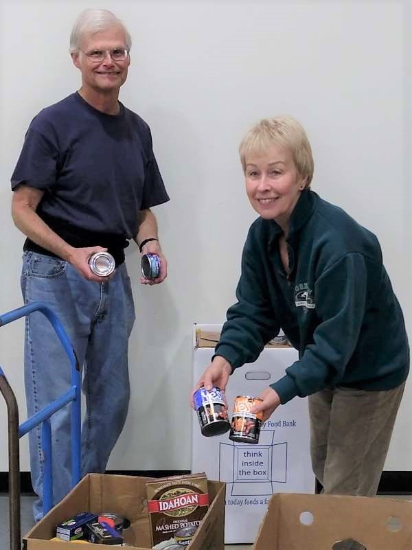 Long-time Volunteers Unload Food Drive