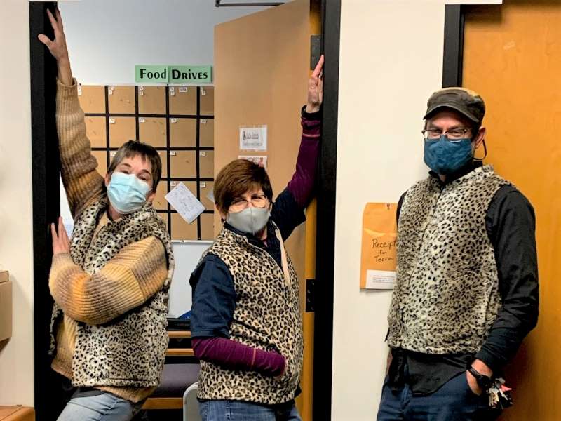 Staff in Food Bank Signature Faux Leopard Vests!
